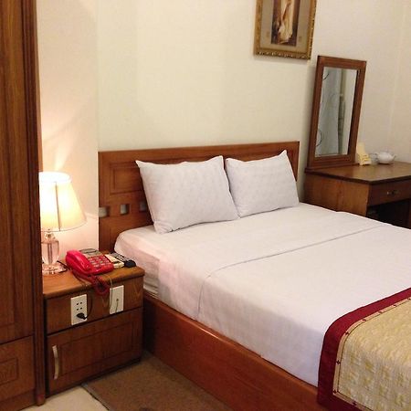 Nam Son Hotel Hô Chi Minh-Ville Chambre photo